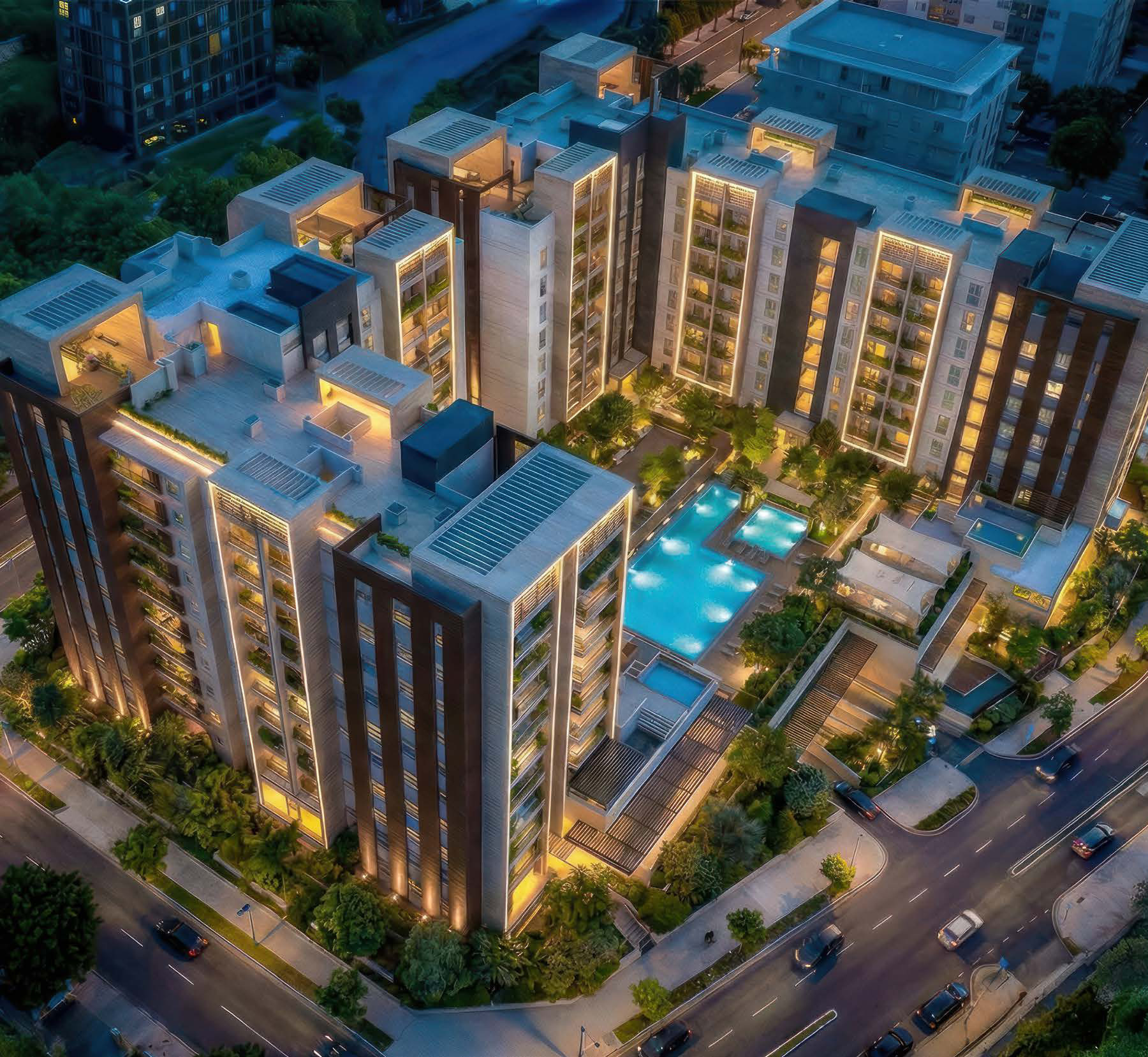 Evening aerial of Sky Park residences and pool